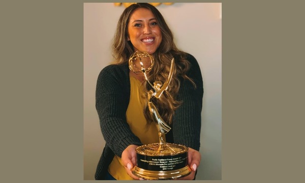 image shows Candace with her Emmy