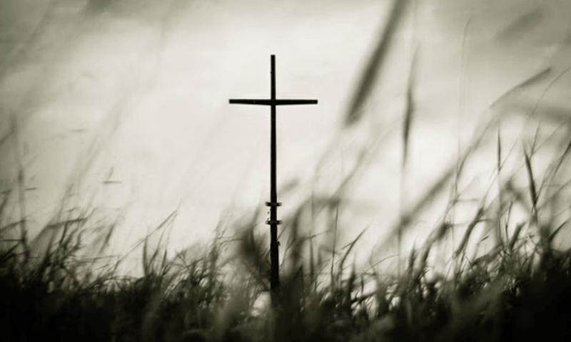 Image shows a silhouette of the cross 