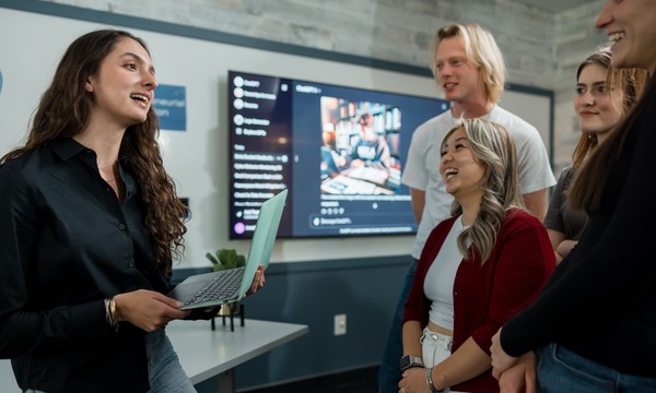 Image shows students in the Biola AI Lab