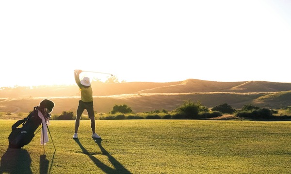 image shows a golfer