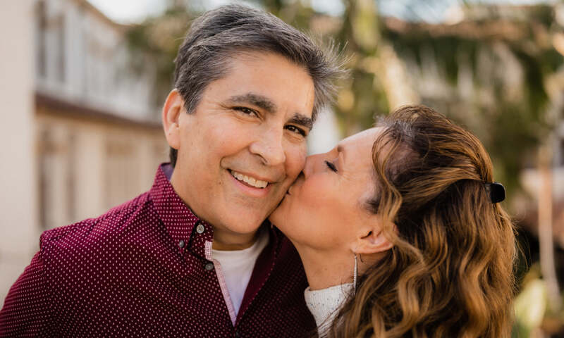 Alisa Grace kissing Chris Grace's cheek
