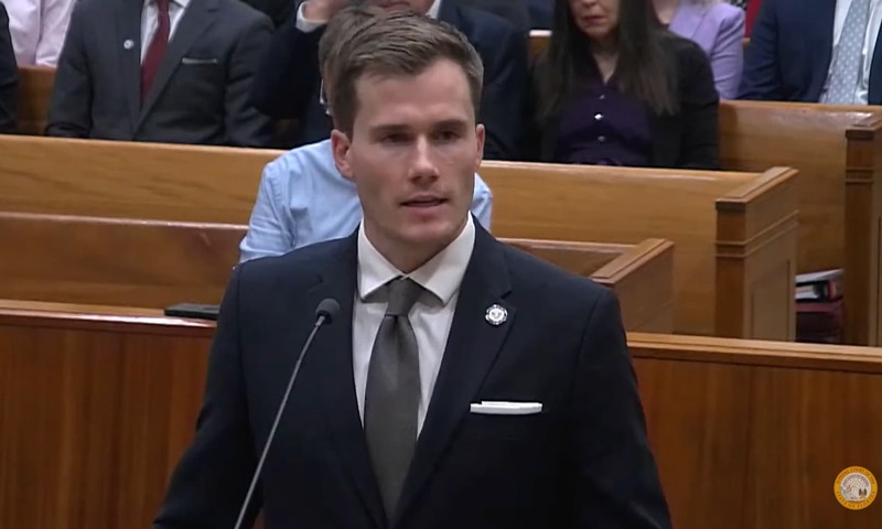 image shows Jason Muehlhoff speaking in front of the court 