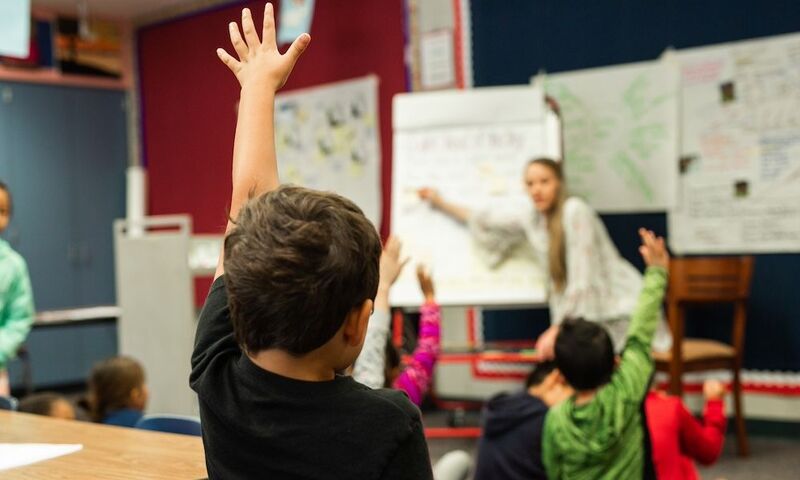Image shows child in class