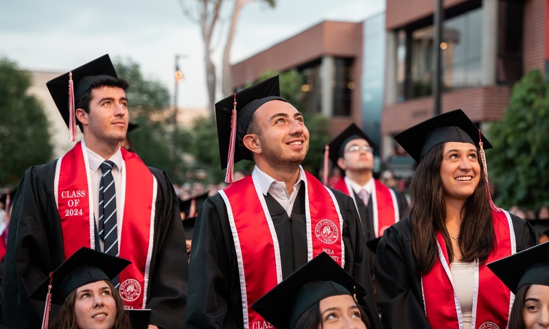 image shows students at commencement