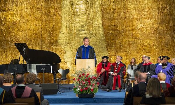 Image shows Dr. Hall giving his address at the ceremony 