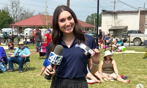 image shows Hunter Elyse with her microphone