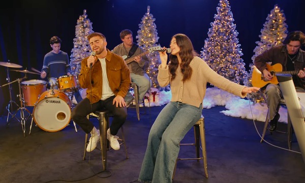 image shows the students singing