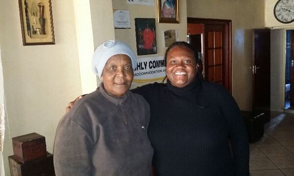 Cook faculty member Katrina Greene (right) with a female entrepreneur in Cape Town, South Africa