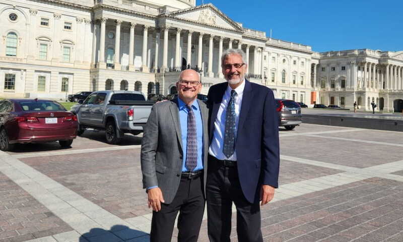 Tim Muehlhoff and Rick Langer in front of the capitol