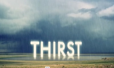 The word "Thirst" in the rain