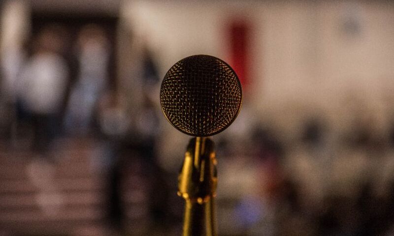 Microphone on stage with blurred background