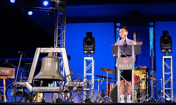 Isaac Peterson in front of podium