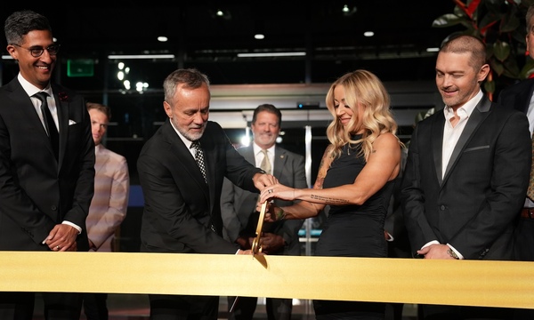 Image shows the ribbon cutting, with Barry Corey and Lynsi Snyder-Ellingson