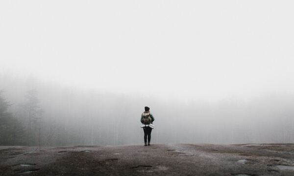 Image shows woman contemplating