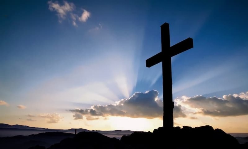 Image of a cross on a hill