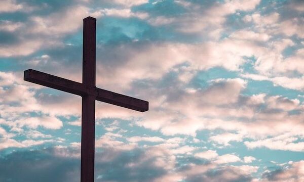 Cross with blue sky in the back