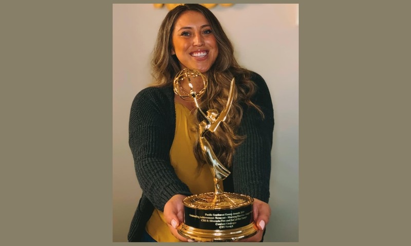 image shows Candace with her Emmy