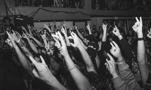image shows people cheering
