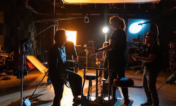 Image shows students working on a set