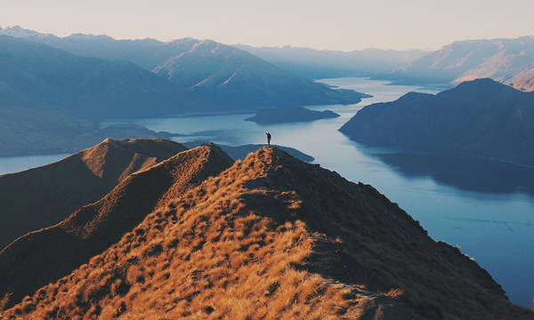 Person hiking on mountains