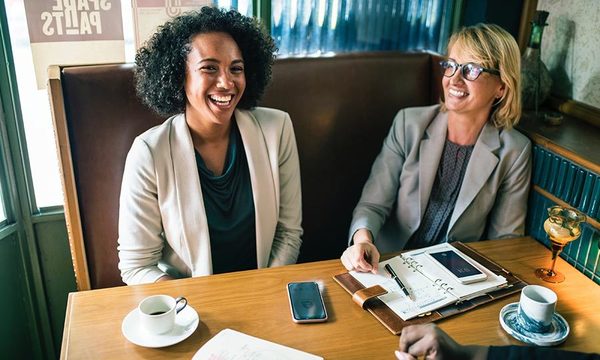 Two women in networking at a restaurant