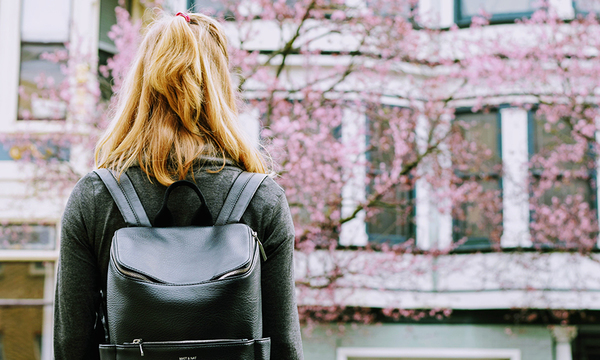 student with backpack