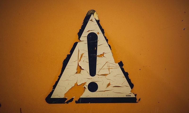 Triangle warning alert sign