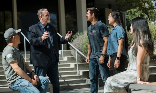 image shows Ed Stetzer speaking with students