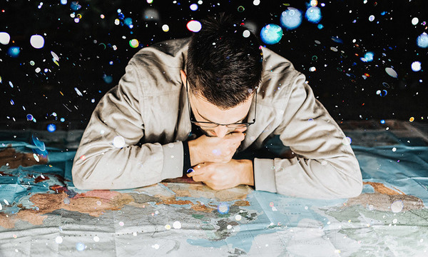 Young man looking at a map
