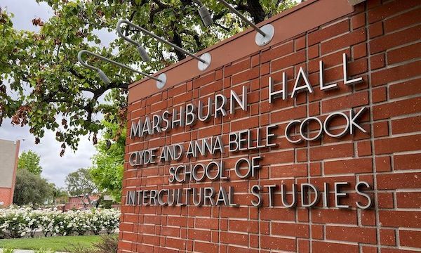 The front of Marshburn Hall, where The Cook School of Intercultural Studies name is displayed.