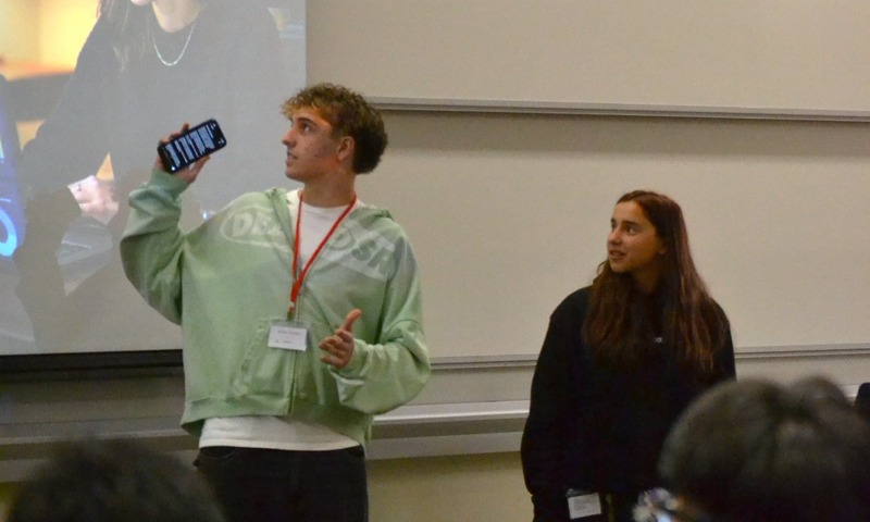image shows students presenting