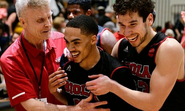 Basketball players and their Coach