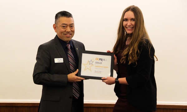 Samantha Sands presented with award