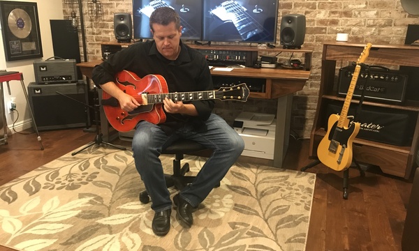 Jeff Askew playing guitar