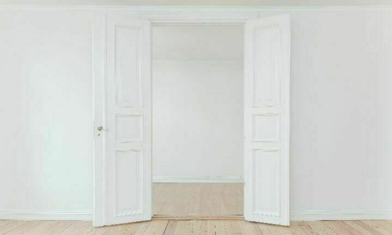 a double door opening into an empty room