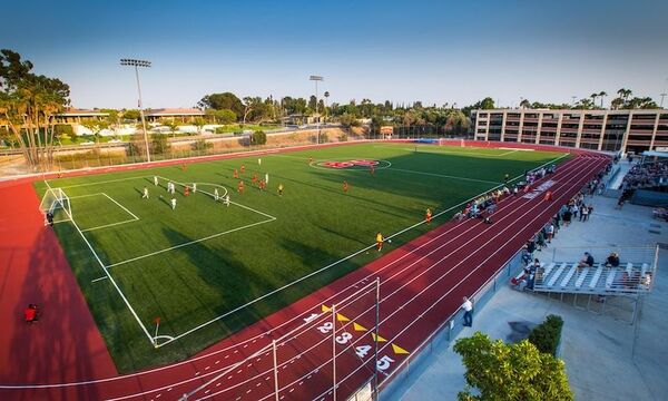 Image shows the Biola soccer field with players on it 