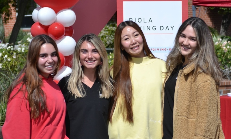 Four Biola students in a group photo