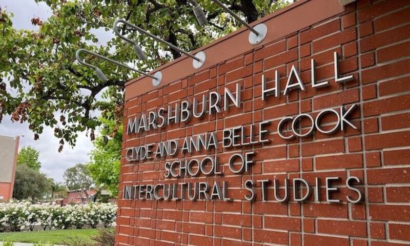 The front of Marshburn Hall, where The Cook School of Intercultural Studies name is displayed. 