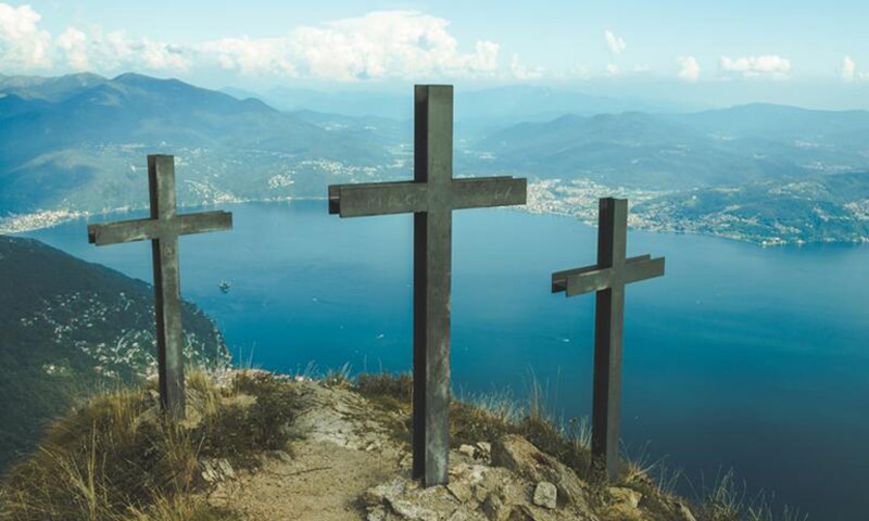 three cross on a hill