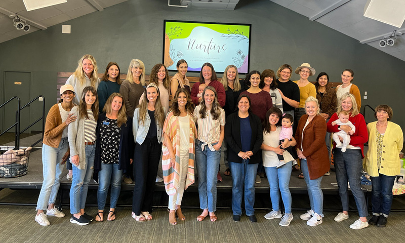 a group of women smiling
