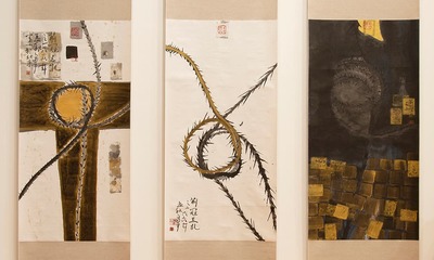 ink and gold on paper scrolls