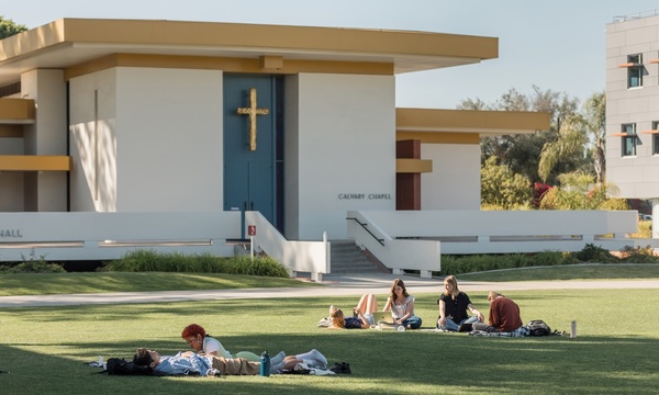 image shows students on Metzger Lawn