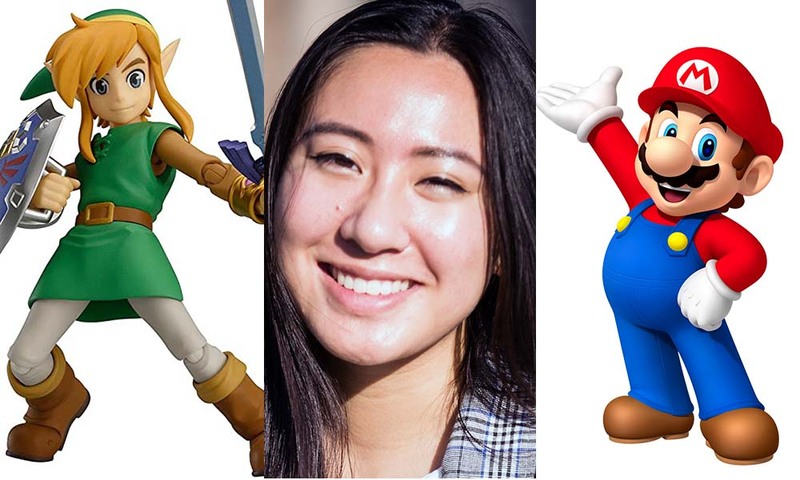 Sarah Hartono flanked by Mario and Link characters