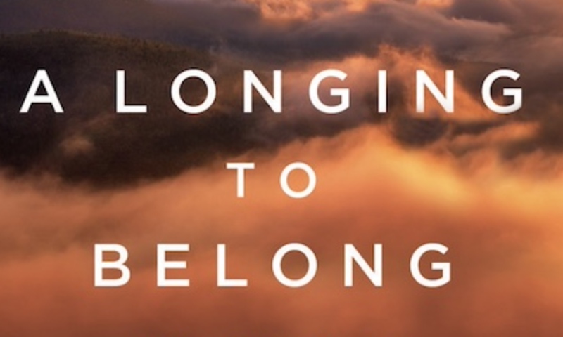 Image shows cover of "A Longing to Belong"