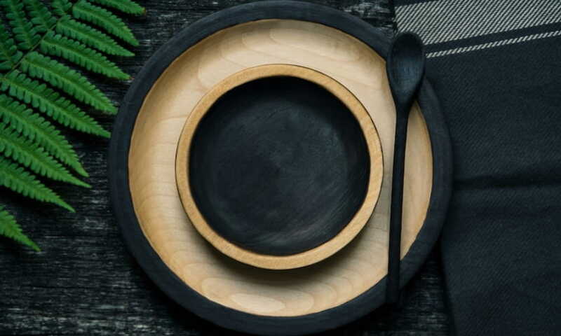 Brown and black wooden bowl and plate