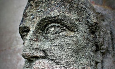 stone sculpture of a man's face