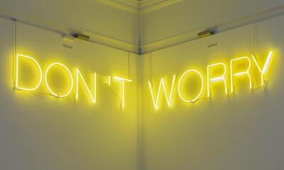 neon sign reading 'Dont Worry'