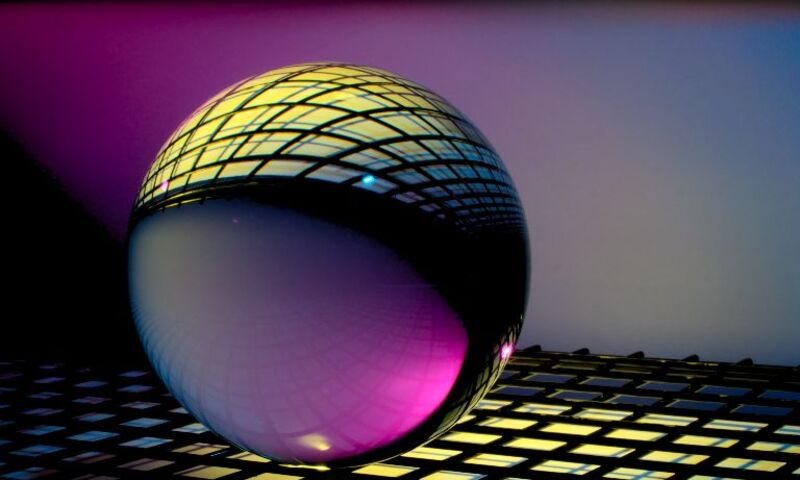 Image shows abstract ball in light filled digital scene