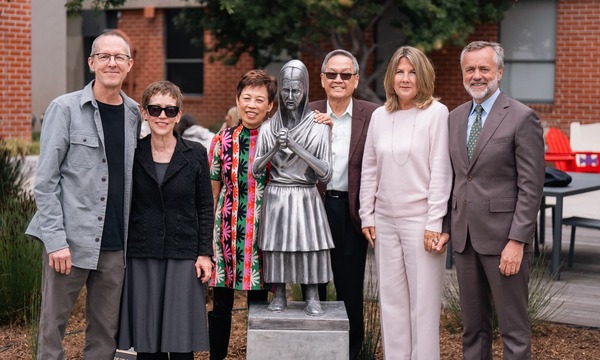 image shows the artist, the donors and the president