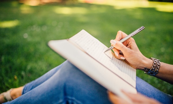 image shows writing in a journal